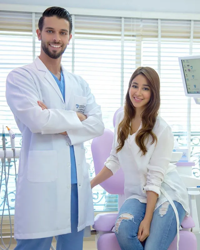Aseel Omran with Dr. Mohammed Naji at Liberty Dental Clinic