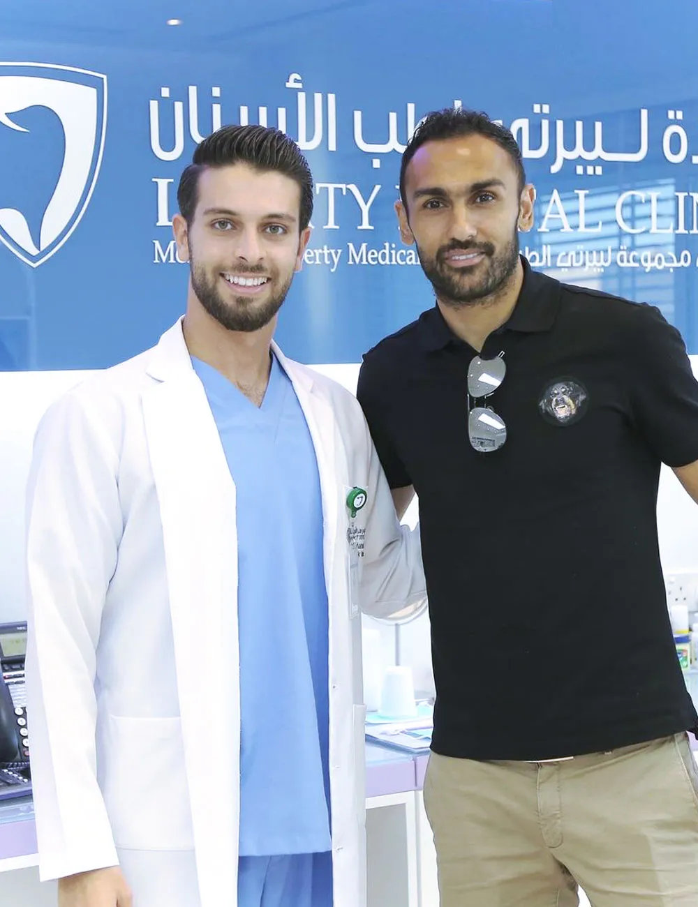 Ahmad Al Mohammady with Dr. Mohammed Naji at Liberty Dental Clinic