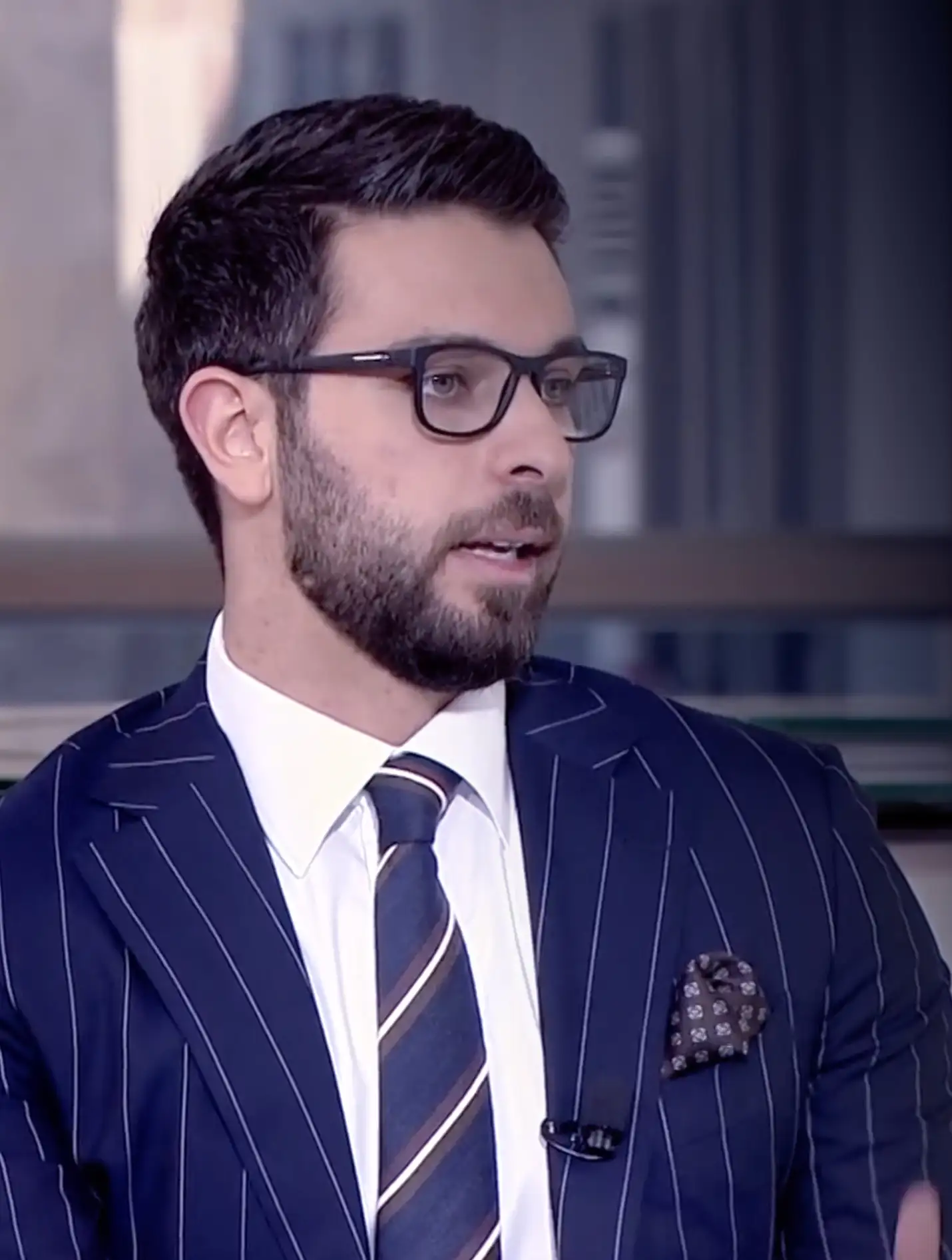 Dr. Mohammed Naji during a television interview